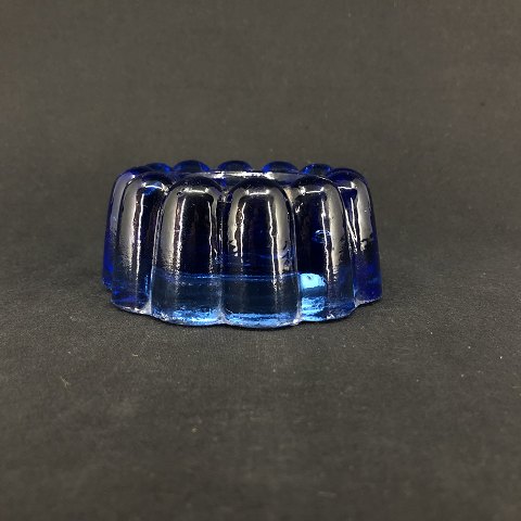Piano foot in blue glass
