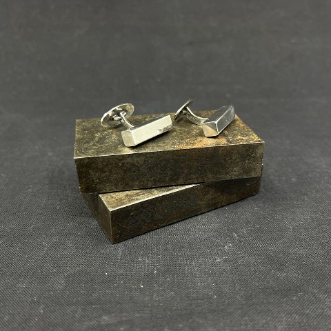 A pair of modern cufflinks in silver