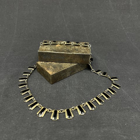 Necklace with black enamel by Volmer Bahner