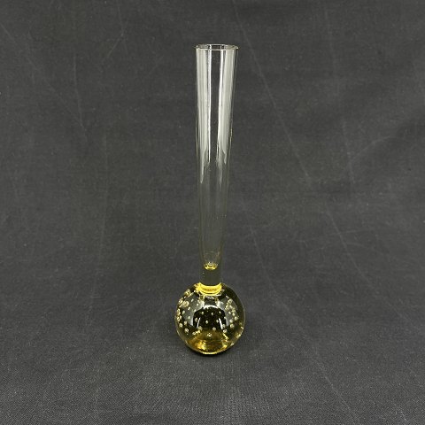 Tall amber orchid vase