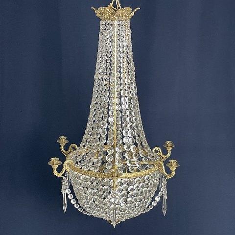 Nice old chandelier with gilded frame