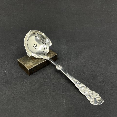 Tang sugar spoon in silver