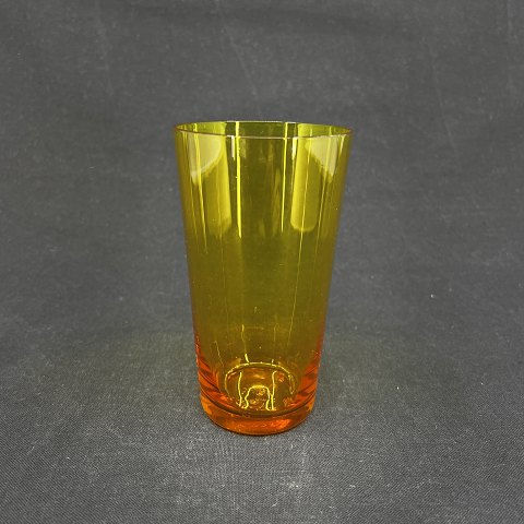 Gylden orange sodavandsglas fra Holmegaard
