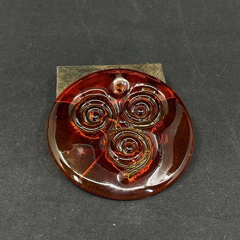 Red sun catcher with circles
