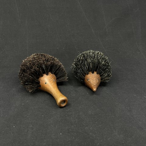 A pair of hedgehogs in teak