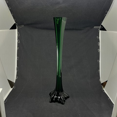 Tall green lily vase