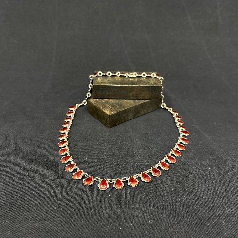 Necklace with red enamel by Volmer Bahner